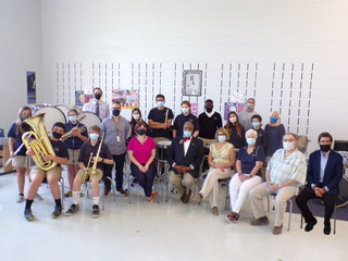 Rotary, students and teachers with donated instruments